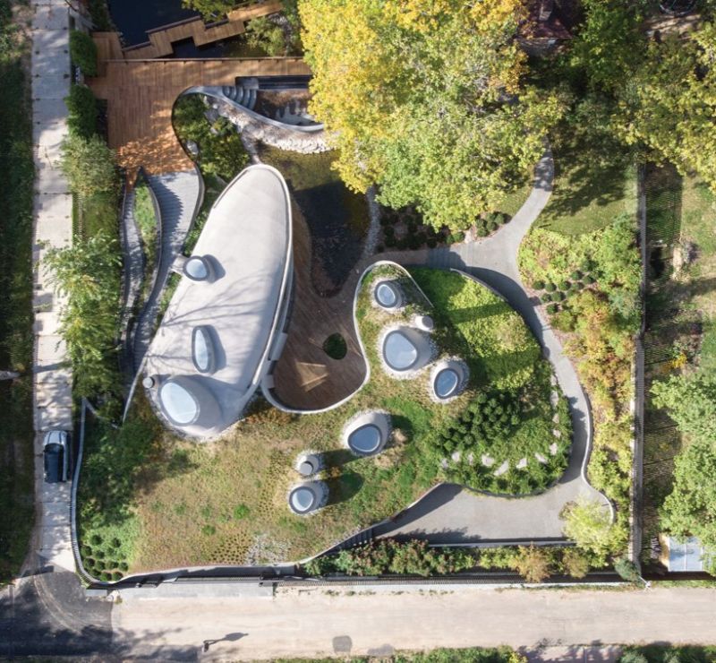 Photo inspiration: Organic Meets Curved Architectural Design Trend House In The Landscape Photo Inspiration
